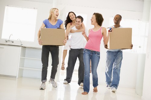Team of professionals preparing furniture for pick-up in Richmond Upon Thames