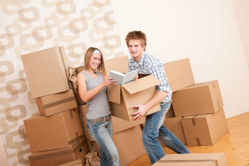 Professional movers loading items into a moving truck